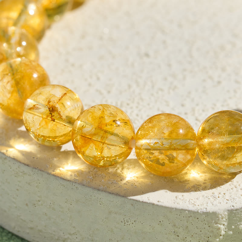 Natural Citrine Pixiu Prosperity Protection Bracelet - 10mm – Close-up of yellow citrine beads texture detail