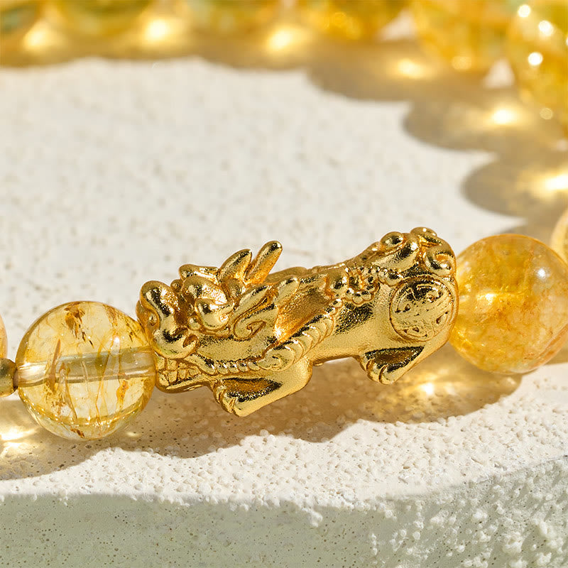 Natural Citrine Pixiu Prosperity Protection Bracelet - 10mm – Close-up of golden Pixiu charm between citrine beads