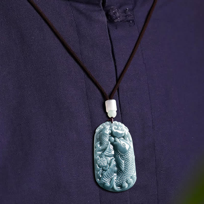 Natural Jade Double Koi Fish Necklace – gift box packaging with elegant red ribbon presentation, prosperity gift