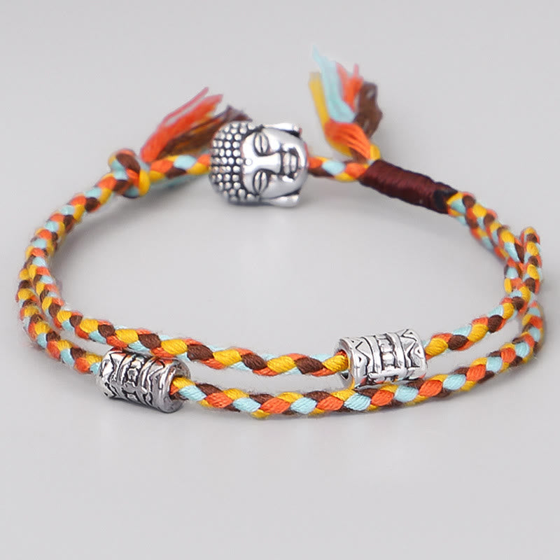 Buddha Head Serenity String Bracelet – Brown yellow braided cord with silver Buddha centerpiece, warm tones