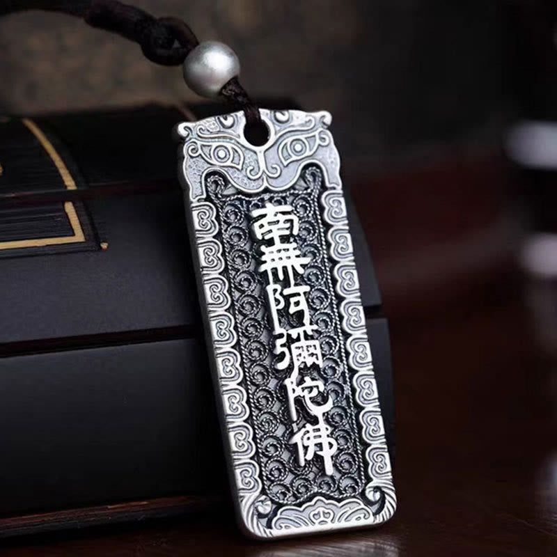 Namo Amitabha Copper Rope Necklace - Pendant with Buddhist invocation beside lacquer box, copper talisman