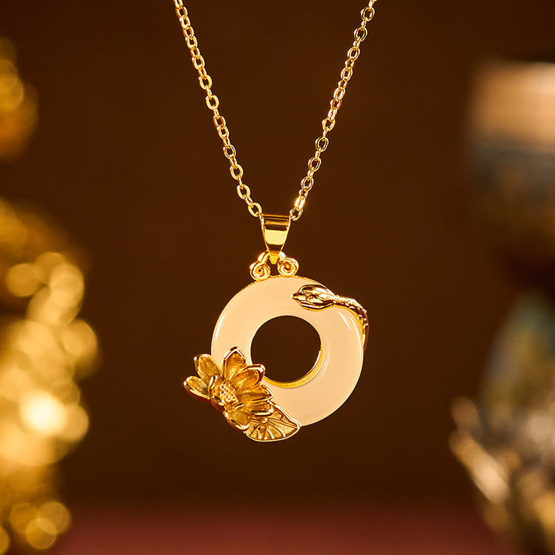 Gold lotus and snake pendant necklace with white jade disc, ornate cable chain, lotus necklace