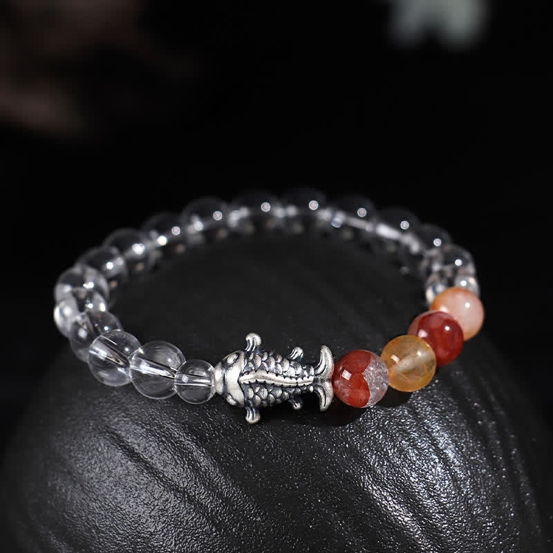 Clear Quartz Koi Fish Bracelet – clear quartz beads with warm accents and silver koi on black stone, protection jewelry