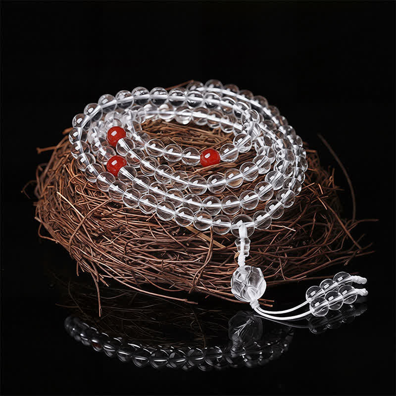 Liuli Lotus 108 Bead Mala - coiled on twig nest with red marker beads, clear crystal meditation necklace