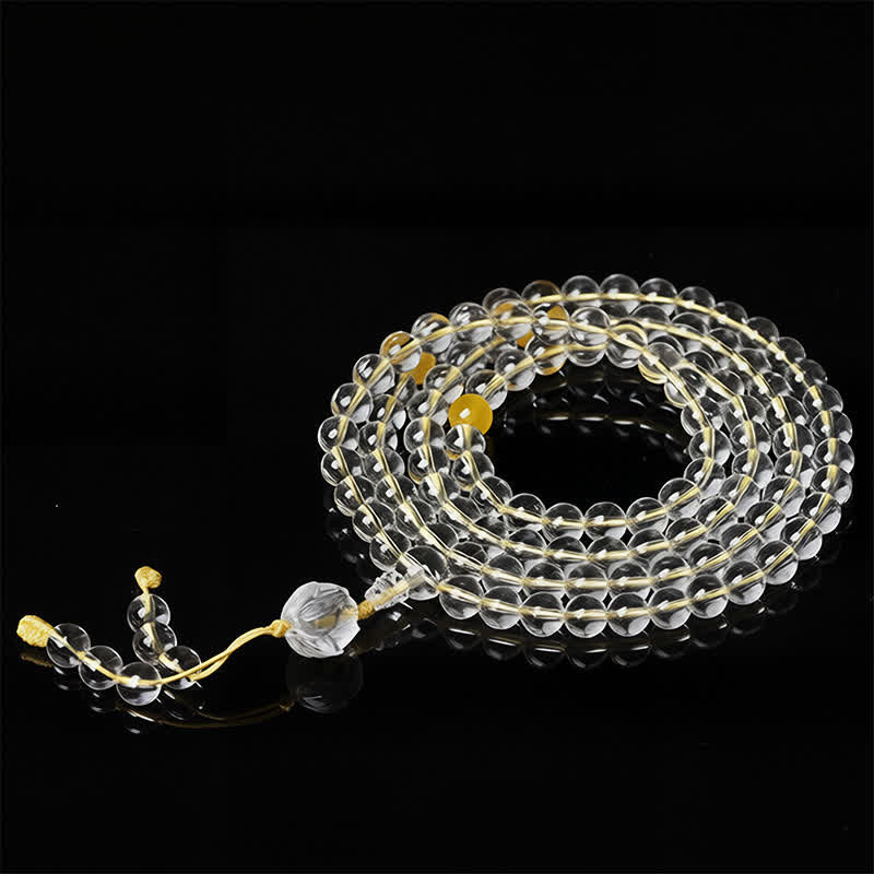 Liuli Lotus 108 Bead Mala - coiled with amber marker beads on yellow cord, clear crystal prayer beads