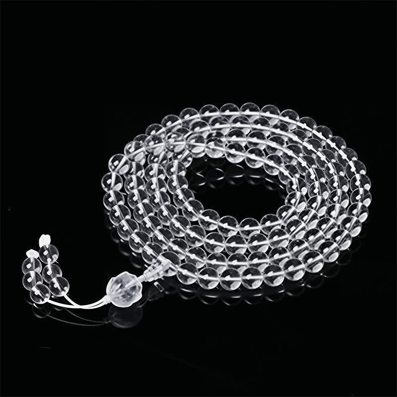 Liuli Lotus 108 Bead Mala - pure clear crystal 108 beads coiled on black, lotus guru bead