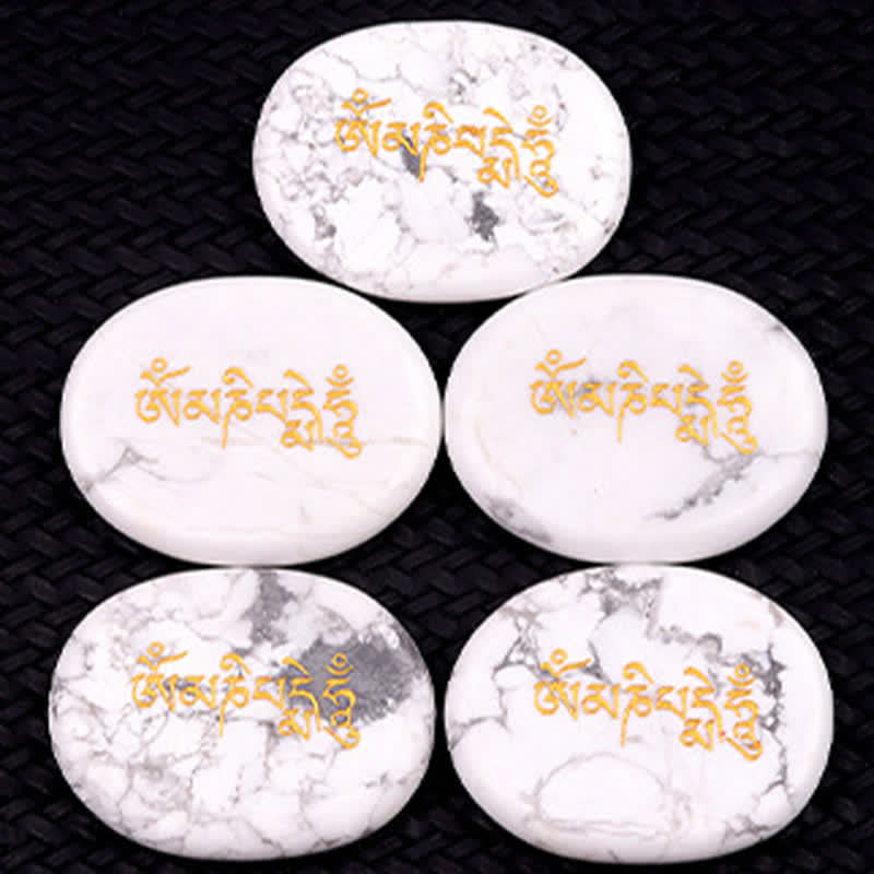 Om Mani Padme Hum Palm Stone – Five white howlite stones with marble veining and gold text