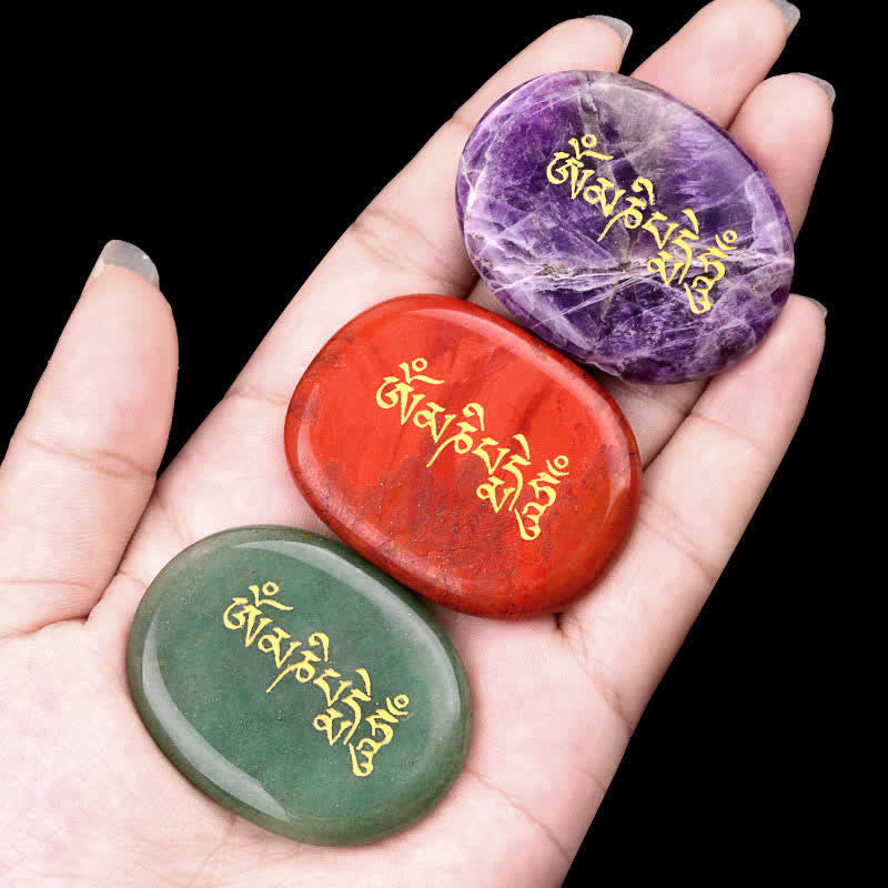 Om Mani Padme Hum Palm Stone – Three gemstones resting in palm showing actual size