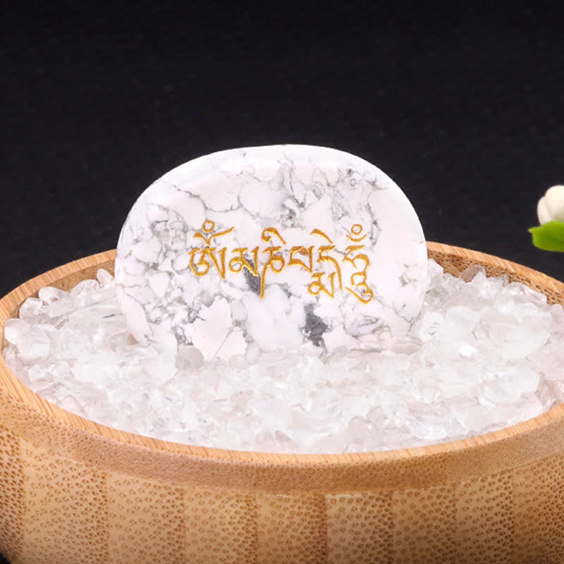 Om Mani Padme Hum Palm Stone – White howlite with gray veining and gold mantra engraving