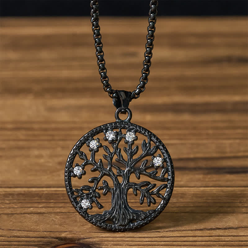 Tree of Life Titanium Steel Necklace – Black gunmetal pendant with crystals on chain, front view wood