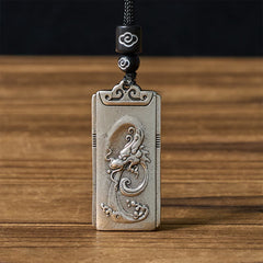 Copper Plated With Silver Dragon Rope Strength Necklace Pendant – Oxidized dragon relief, black braided cord, Serene