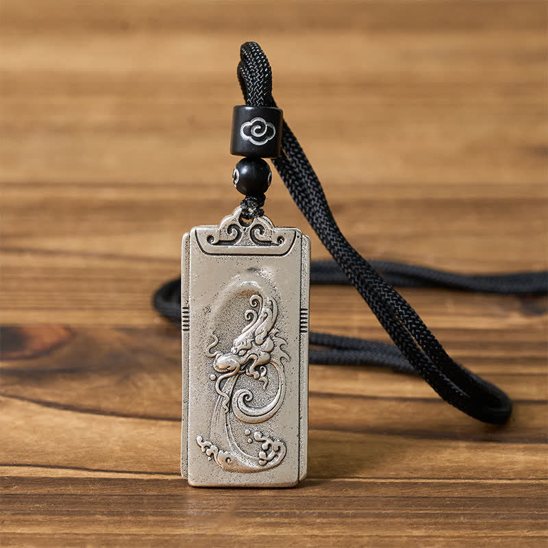 Copper Plated With Silver Dragon Rope Strength Necklace Pendant – Front view, black rope, oxidized finish, Steadfast