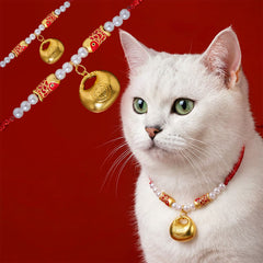 Red String Koi Fish Pet Collar – white cat wearing red cord with pearls, gold koi beads, fu lock, on red background