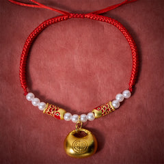 Red String Koi Fish Pet Collar – top-down flat lay, red braided cord with gold fu lock, koi beads, pearls on red