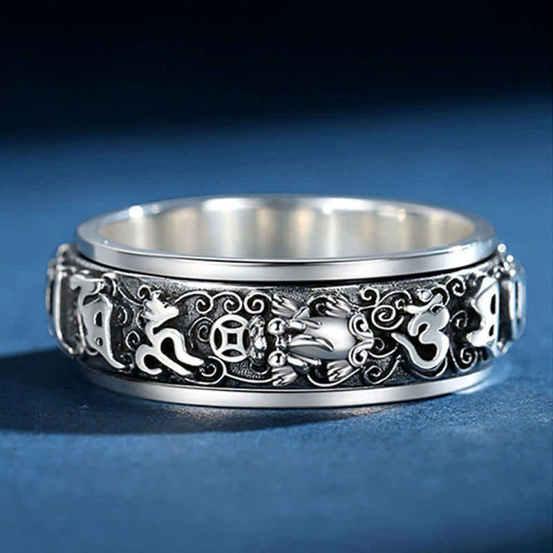 Pixiu Om Mani Padme Hum Copper Rotatable Ring for Men – Close-up of Pixiu and coin symbol on blue, good luck