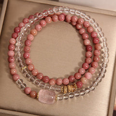 Rhodonite Clear Quartz Rose Quartz Pixiu Triple Wrap Bracelet – top view three strands on gold box showing bead pattern