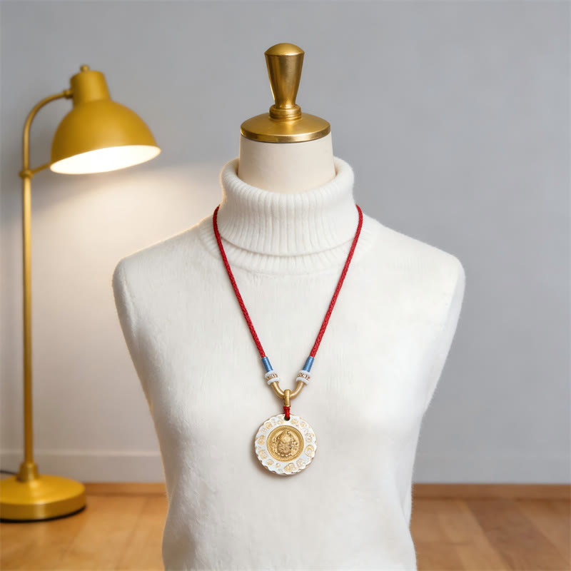 Tibet Yellow Jambhala God of Wealth Alloy Protection Necklace – wearing on chest with traditional attire, cultural jewelry