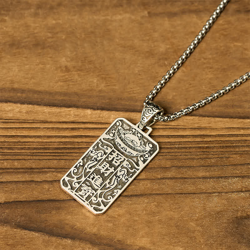 Copper Pixiu Chain Wealth Necklace Pendant - Feng Shui Attract – Back tilted showing engraved symbols on wood