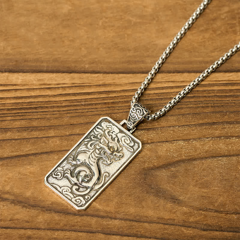 Copper Pixiu Chain Wealth Necklace Pendant - Feng Shui Attract – Tilted angle view on wood surface, engraved