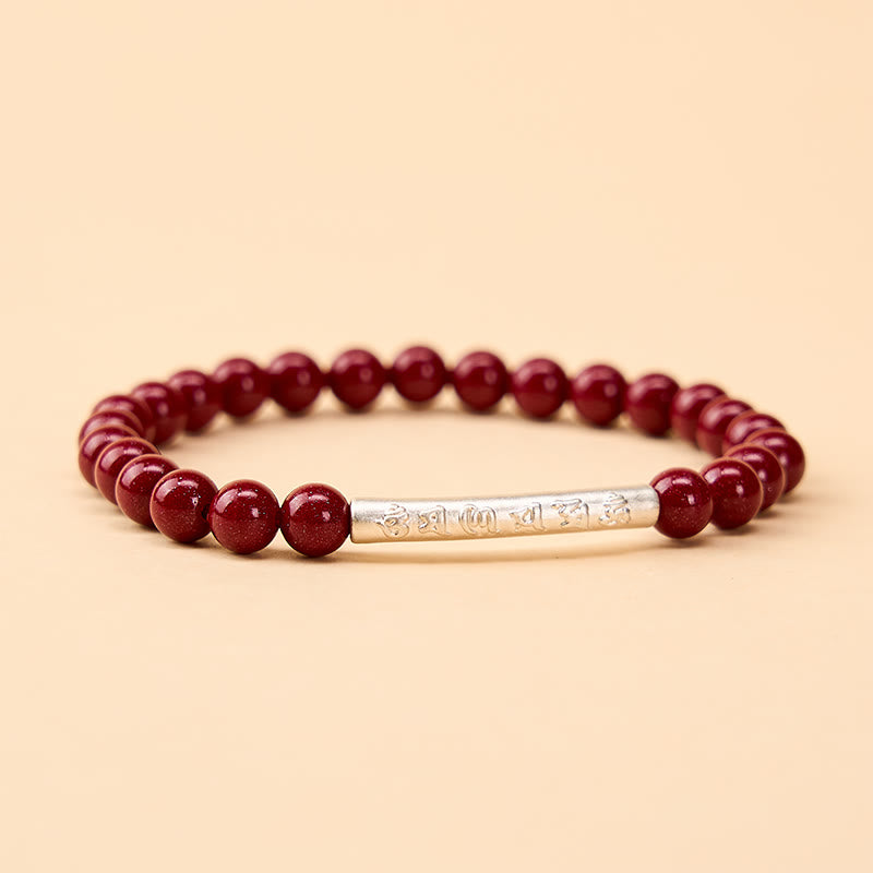Sterling Silver Om Mani Padme Hum Bracelet – Silver mantra cylinder on red cinnabar beads, silver bracelet