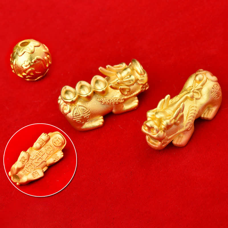 Natural Tiger Eye Pixiu Fu Om Mani Padme Hum Bracelet – golden Pixiu charm components on red background showing craftsmanship