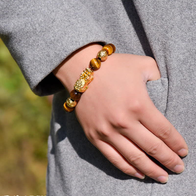 Natural Tiger Eye Pixiu Fu Om Mani Padme Hum Bracelet – model in grey coat hand in pocket, outdoor lifestyle shot