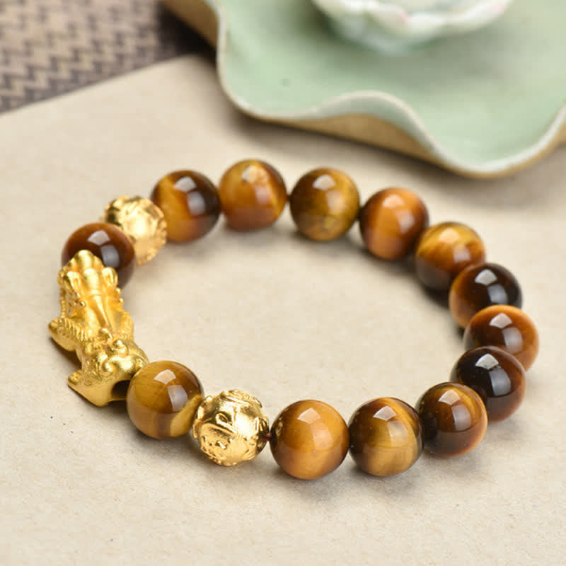 Natural Tiger Eye Pixiu Fu Om Mani Padme Hum Bracelet – golden Pixiu bracelet with celadon ceramic dish accent on beige