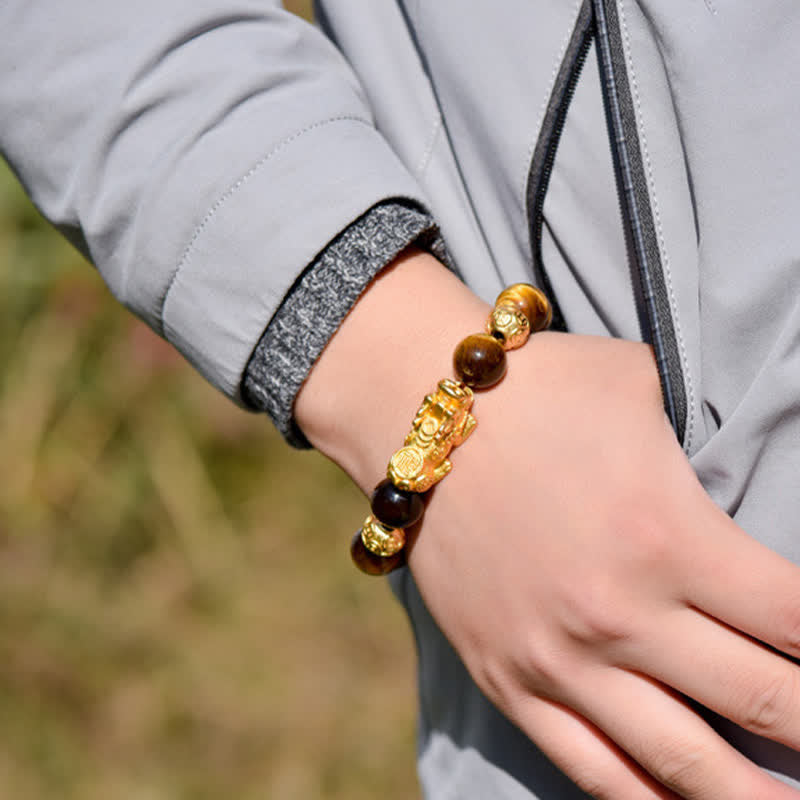 Natural Tiger Eye Pixiu Fu Om Mani Padme Hum Bracelet – worn on wrist with grey jacket outdoor, courage feng shui bracelet