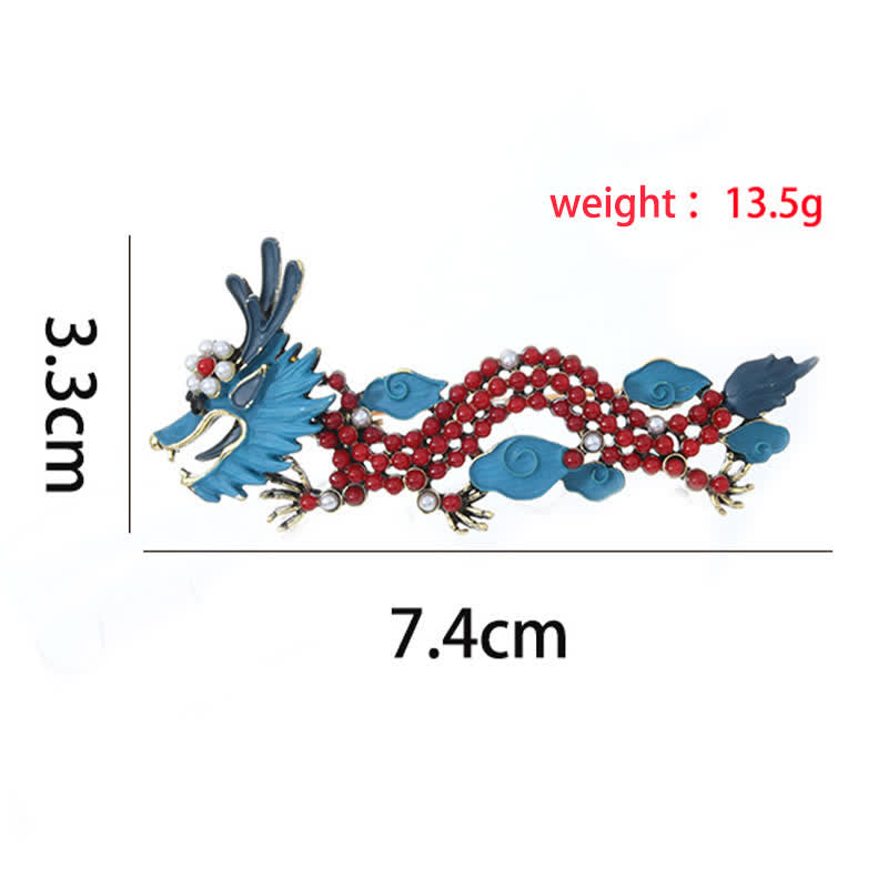 Blue Dragon Red Turquoise Luck Brooch – White background flat lay, navy enamel, red bead body, Lucky
