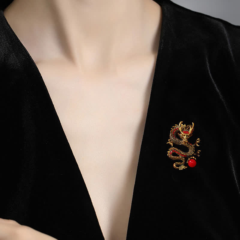 Domineering Dragon Pearl Strength Alloy Brooch – gold dragon pin on black velvet lapel showing wear styling, power