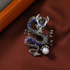 Domineering Dragon Pearl Strength Alloy Brooch – silver-tone dragon brooch with blue spine stones, protective power