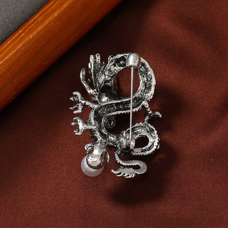 Domineering Dragon Pearl Strength Alloy Brooch – reverse side showing pin mechanism and solid metal construction, power