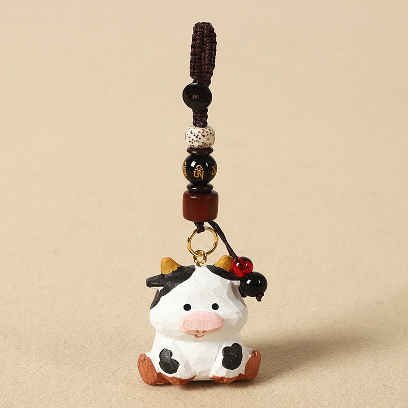 Chinese Zodiac Keychain – Hand-carved ox with spotted bead and gold mantra, zodiac charm