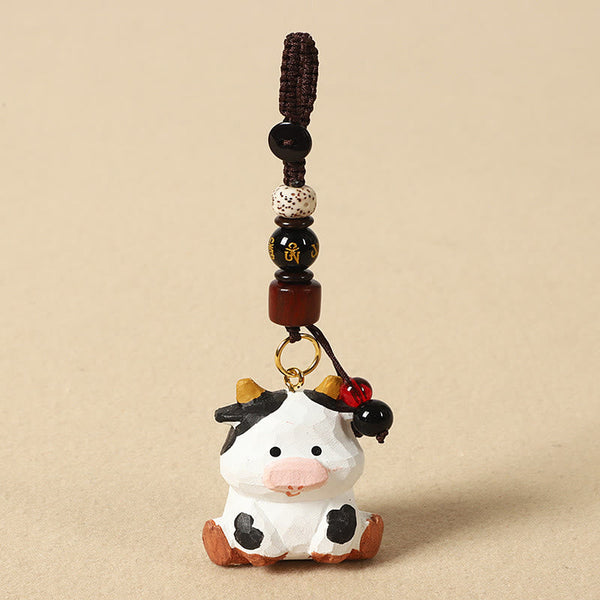 Chinese Zodiac Keychain – Hand-carved ox with spotted bead and gold mantra, zodiac charm
