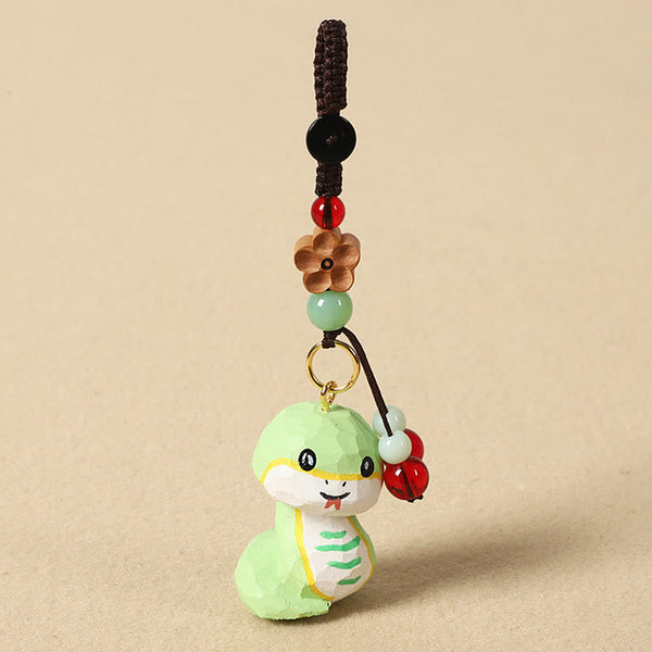 Chinese Zodiac Keychain – Coiled snake with red bead and wood flower, animal charm