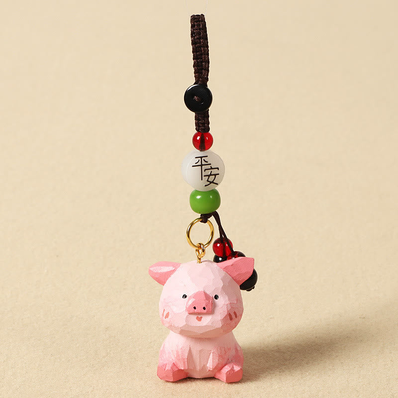 Chinese Zodiac Keychain – Carved pig with peace bead and green stone, zodiac charm