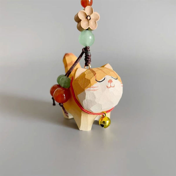 Orange Tabby Cat Keychain – Low angle showing faceted carving and red bead accents, artisan wood cat charm