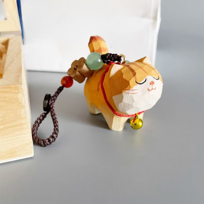 Orange Tabby Cat Keychain – Front-right view with beaded tassel and braided cord, hand-carved cat pendant