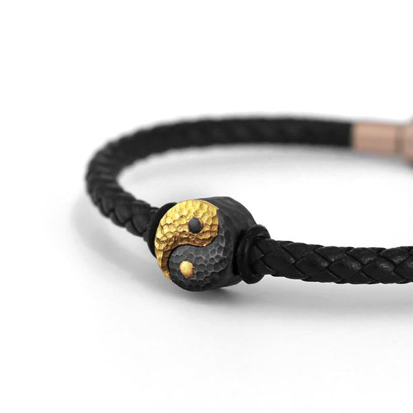 Yin Yang Bagua Leather Bracelet - Gold and black yin yang charm detail on white background, zen bracelet