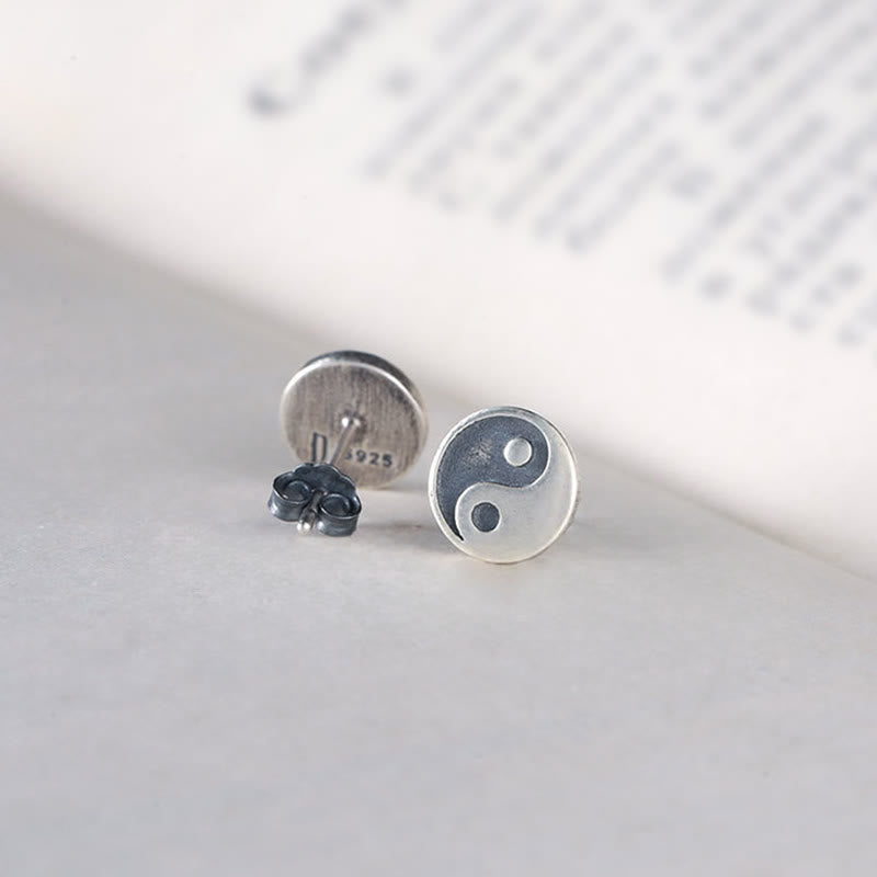 Yin Yang Stud Earrings - Front and S925 back detail on book pages, sterling silver yin yang studs