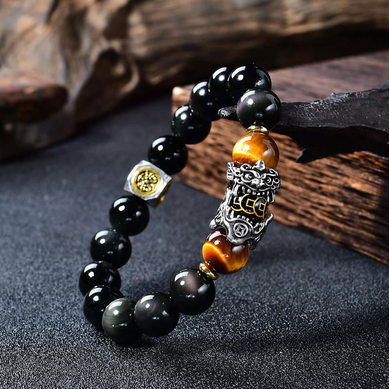 Natural Black Obsidian PiXiu Tiger's Eye Bracelet – close-up silver PiXiu, obsidian and tiger eye beads, feng shui wealth