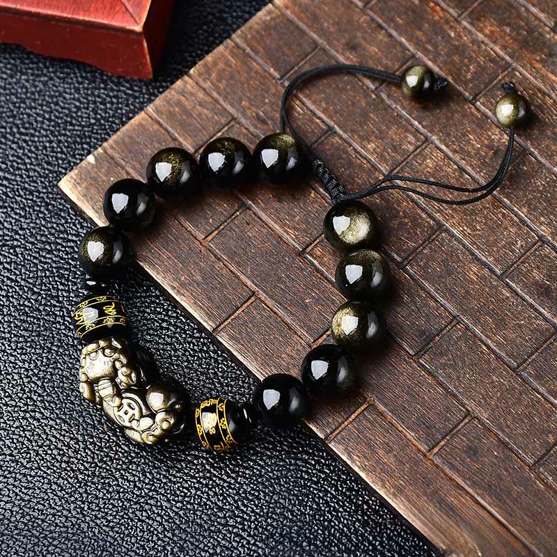 Gold Sheen Obsidian PiXiu Bracelet – Alternate top view on bamboo, glossy beads, gold Pi Xiu, Om Mani Padme Hum spacer