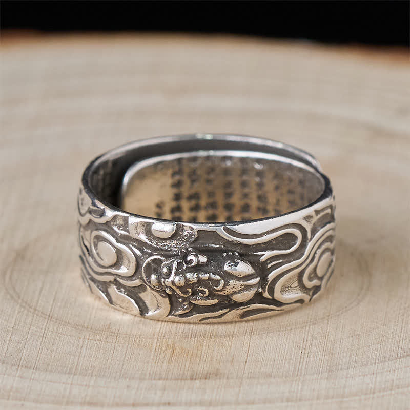 PiXiu Heart Sutra Copper Ring – All silver variant top view on wood, Pi Xiu head relief, vintage men jewelry