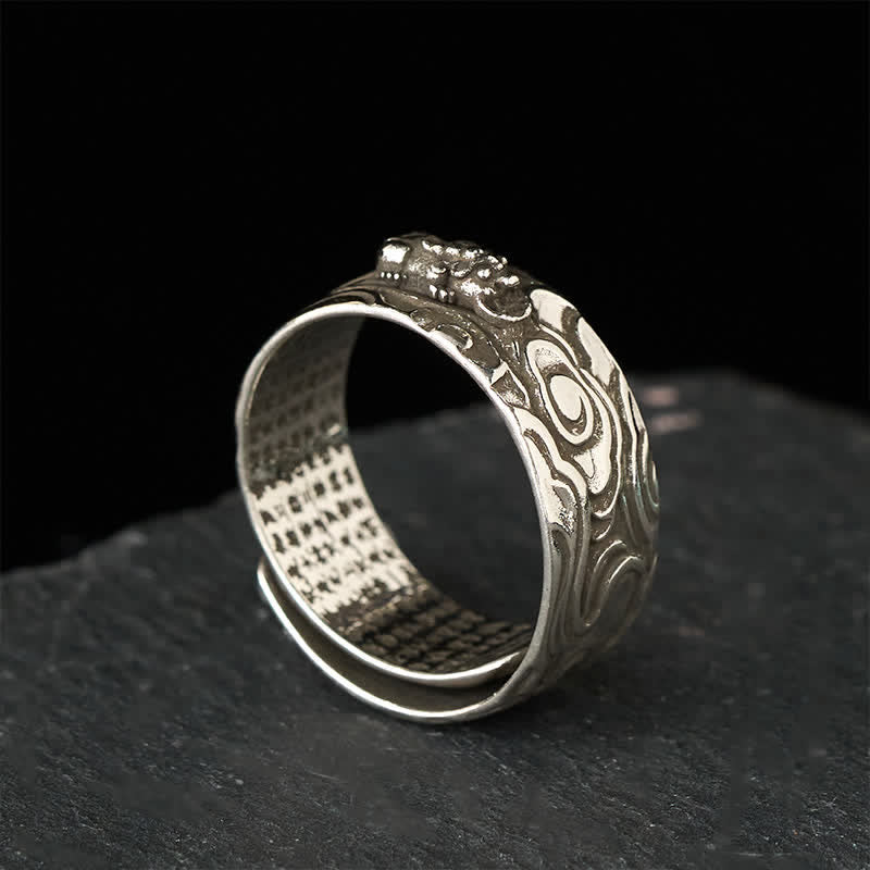 PiXiu Heart Sutra Copper Ring – All silver variant standing on dark stone, adjustable wealth ring, detailed scripture