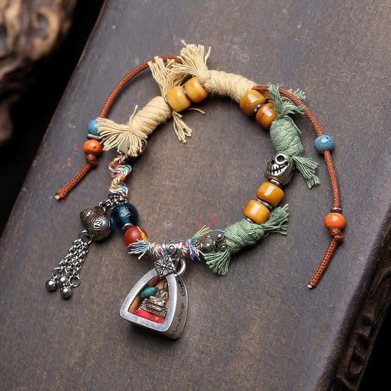 Copper Buddha Amitabha Bracelet – bracelet laid flat showing full length and charm, copper bracelet, Amitabha charm, rope