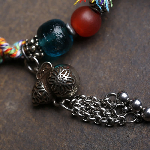Copper Buddha Amitabha Bracelet – braided rope detail showing tight even weave, copper bracelet, Amitabha charm, rope