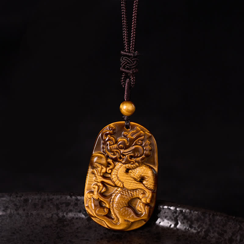 Tiger Eye Carved Dragon Rope Protection Necklace – golden chatoyant dragon relief with endless knot detail, luck