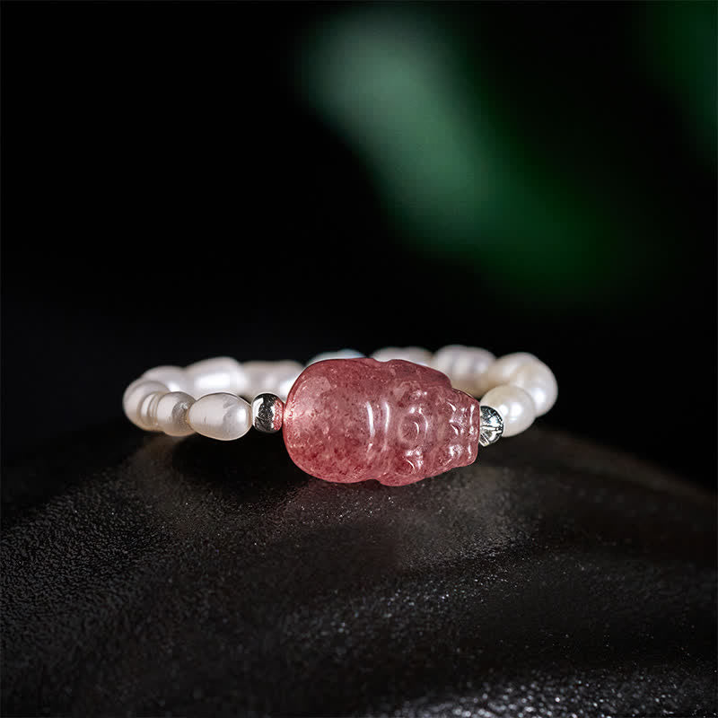 3mm PiXiu Gemstone Ring – Side angle of pearl ring with PiXiu on dark textured background, chic