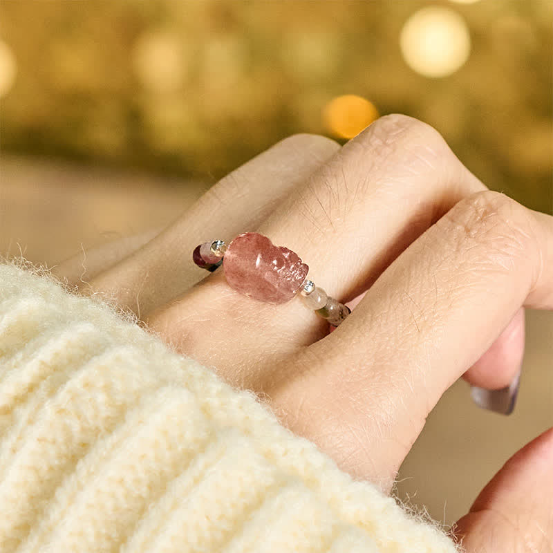3mm PiXiu Gemstone Ring – Hand model wearing tourmaline PiXiu ring with cream sweater, fashion