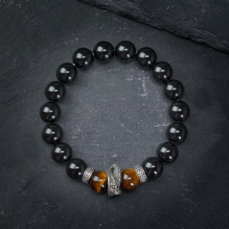 Silver Sheen Obsidian Red Tiger Eye Dragon Success Bracelet - three-quarter angle snake charm with amber beads, mysterious
